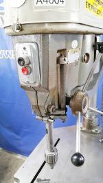 used delta/rockwell drill press with t-slotted cast iron stand and