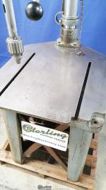 used delta/rockwell drill press with t-slotted cast iron stand and