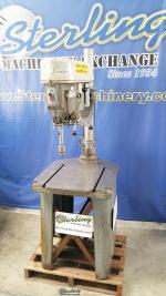 used delta/rockwell drill press with t-slotted cast iron stand and